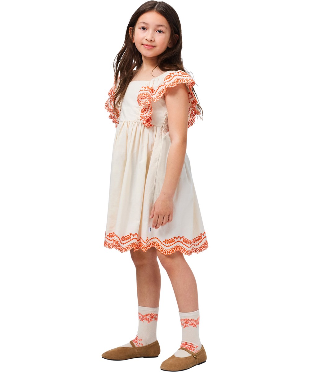 Clementine - Pearled Ivory - Off-white knee-length dress for children made of organic cotton with an embroidery 