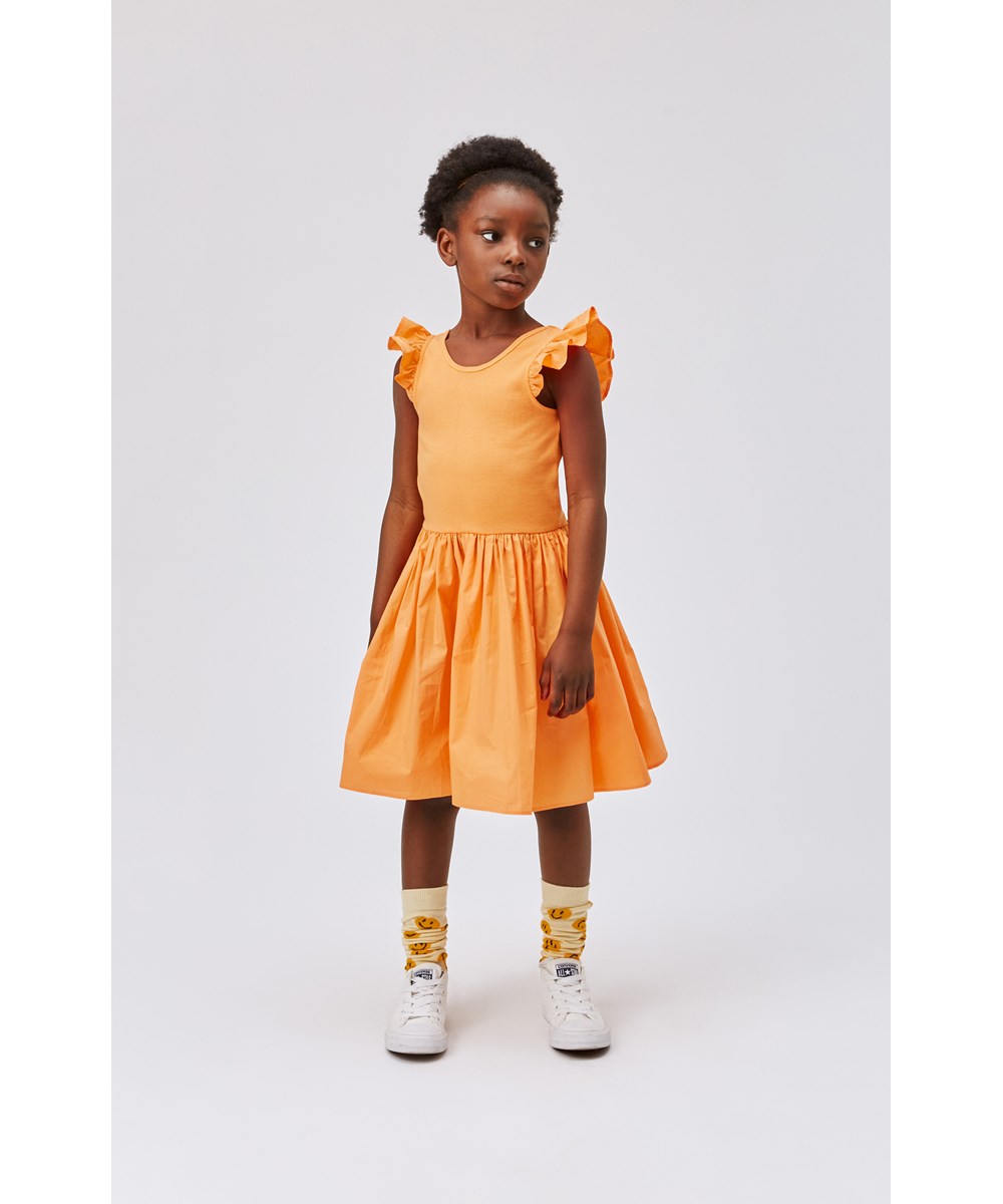 Cloudia - Papaya - Orange dress in organic cotton with ruffles at the shoulders
