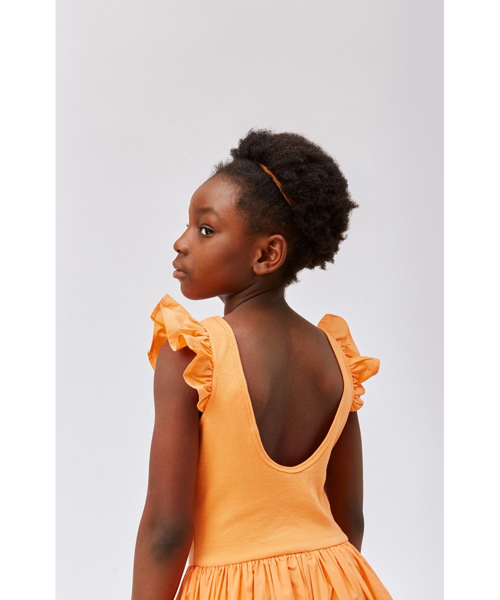 Cloudia - Papaya - Orange dress in organic cotton with ruffles at the shoulders