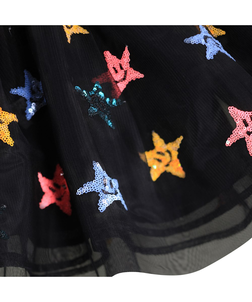 Cyrus - Black - Black long-sleeved dress for children with a black tulle skirt with sequin stars.