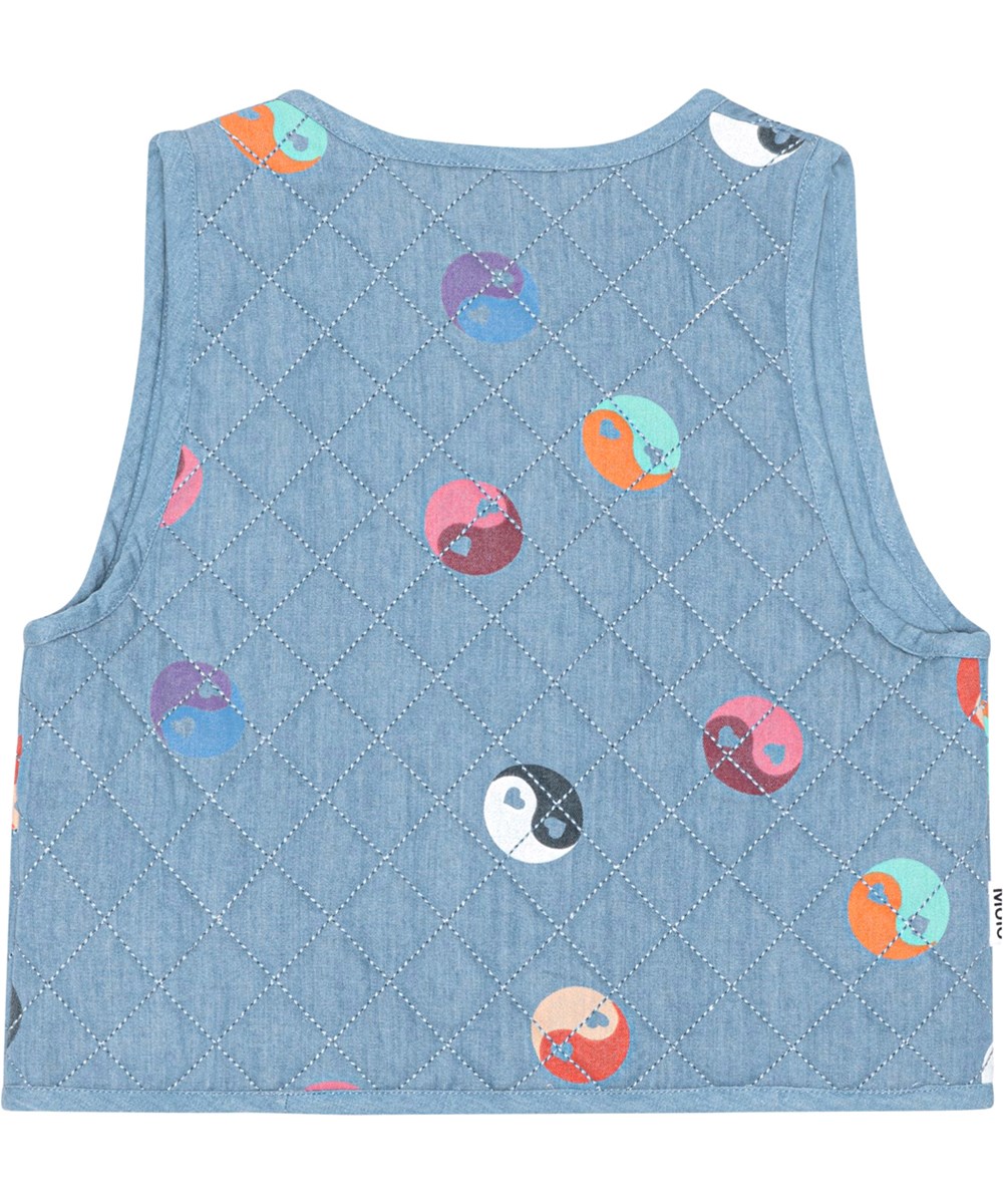 Hilma - Yin Yang Mini - Blue denim, lined waistcoat in quilted cotton with a print of yin/yang symbols