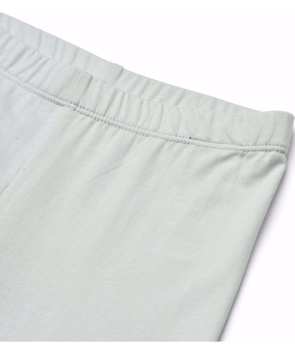 Nica - Skywriting - Close-fitting light blue leggings in stretchy organic cotton with an elastic waistband.