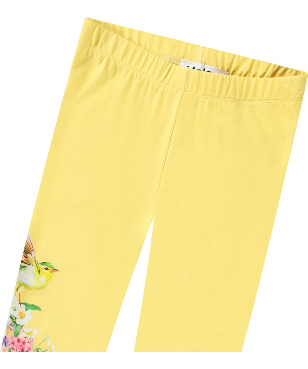 Niki - Party Ready - Yellow leggings with print for children in stretchy organic cotton with an elastic waistband.
