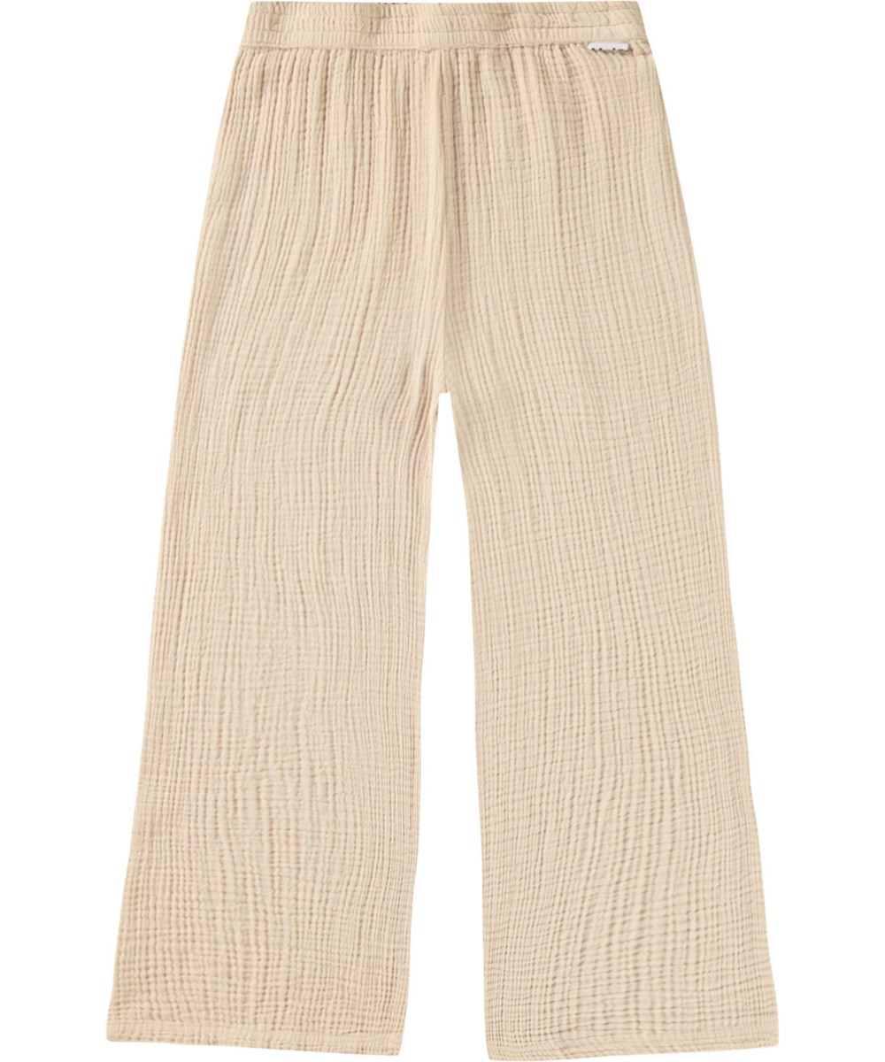 Agatha - Brazilian Sand - Loose summer pants in sand-coloured crinkled cotton for children.