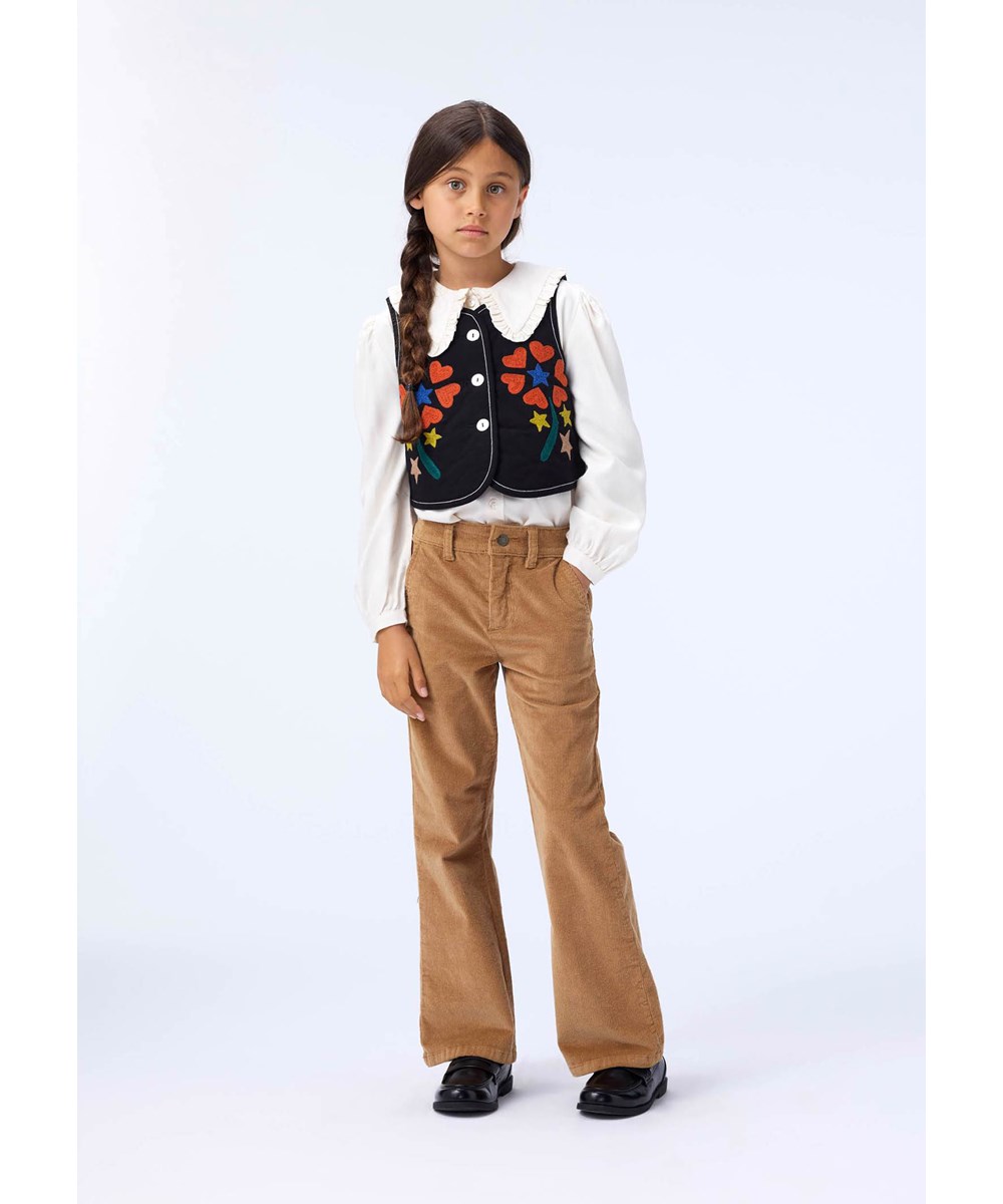 Aida - Pomeranian - Light brown pants for children made of soft cotton velvet in a trumpet-shaped silhouette.