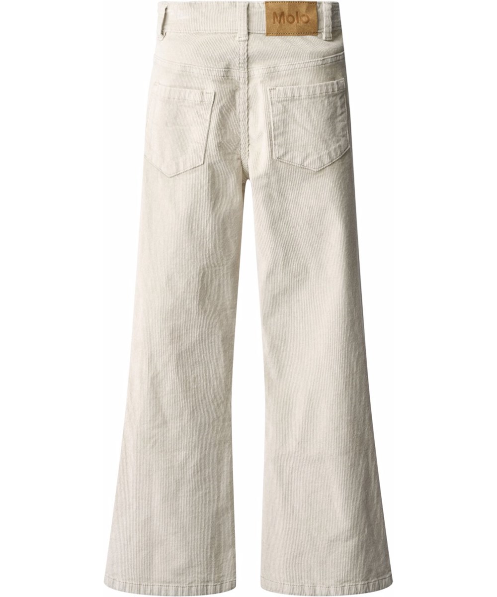 Aida - Quiet Grey - Off-white pants for children made of soft cotton velvet in a trumpet-shaped silhouette.