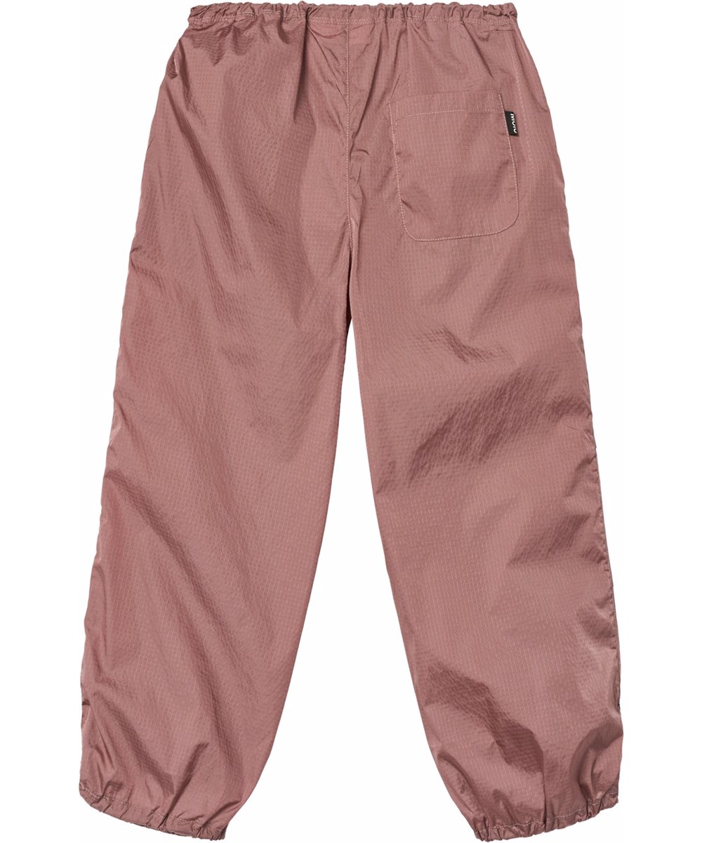 Alaina - Tulip - Dark pink sporty nylon pants for children.