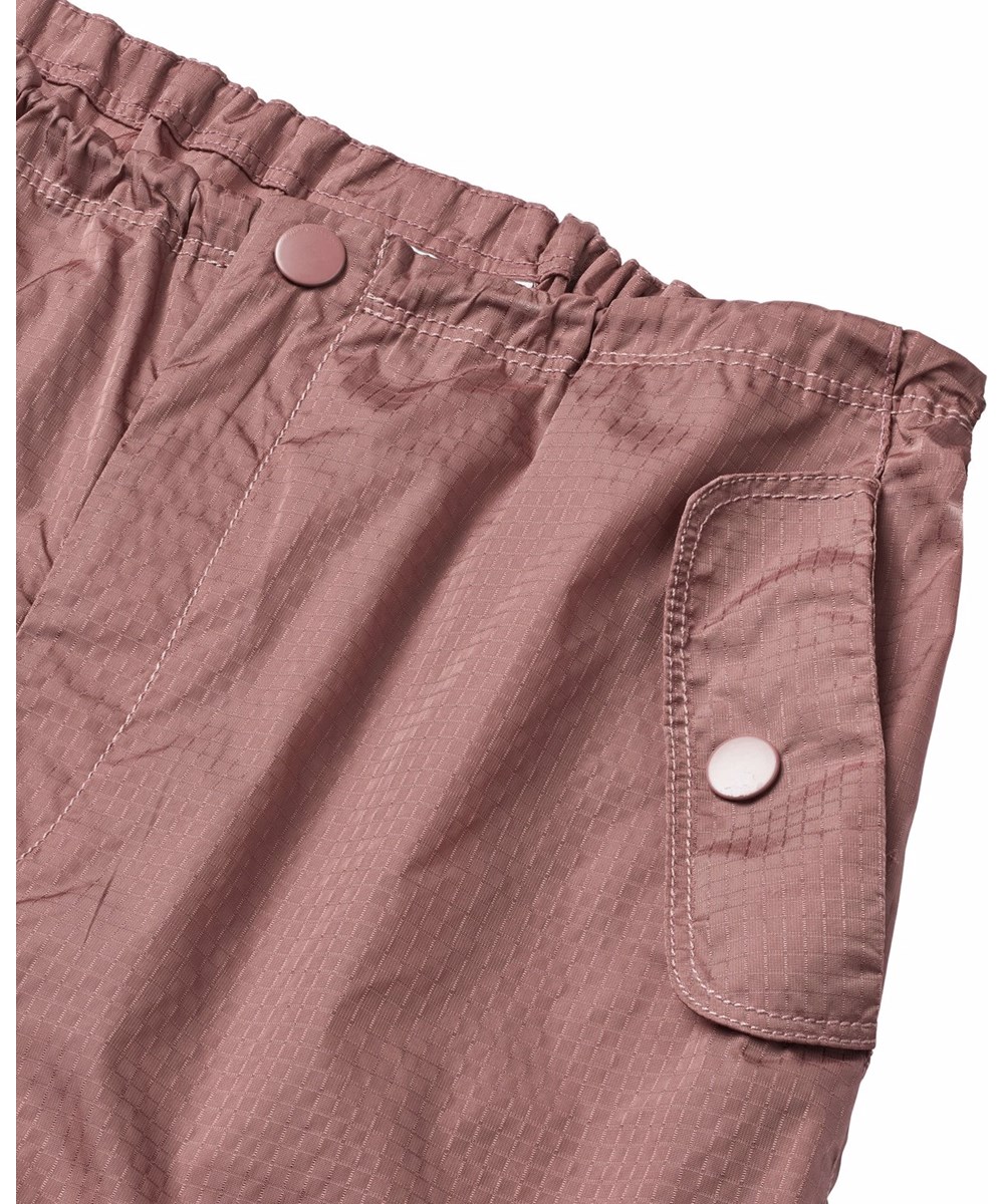 Alaina - Tulip - Dark pink sporty nylon pants for children.