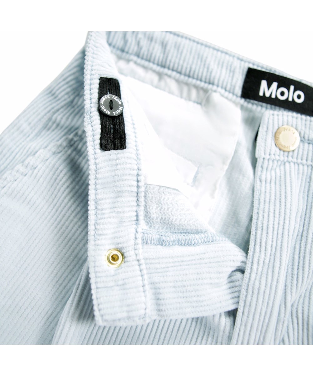 Alaine - Blue Moon - Light blue pants for children made of soft cotton velvet in a loose fit.