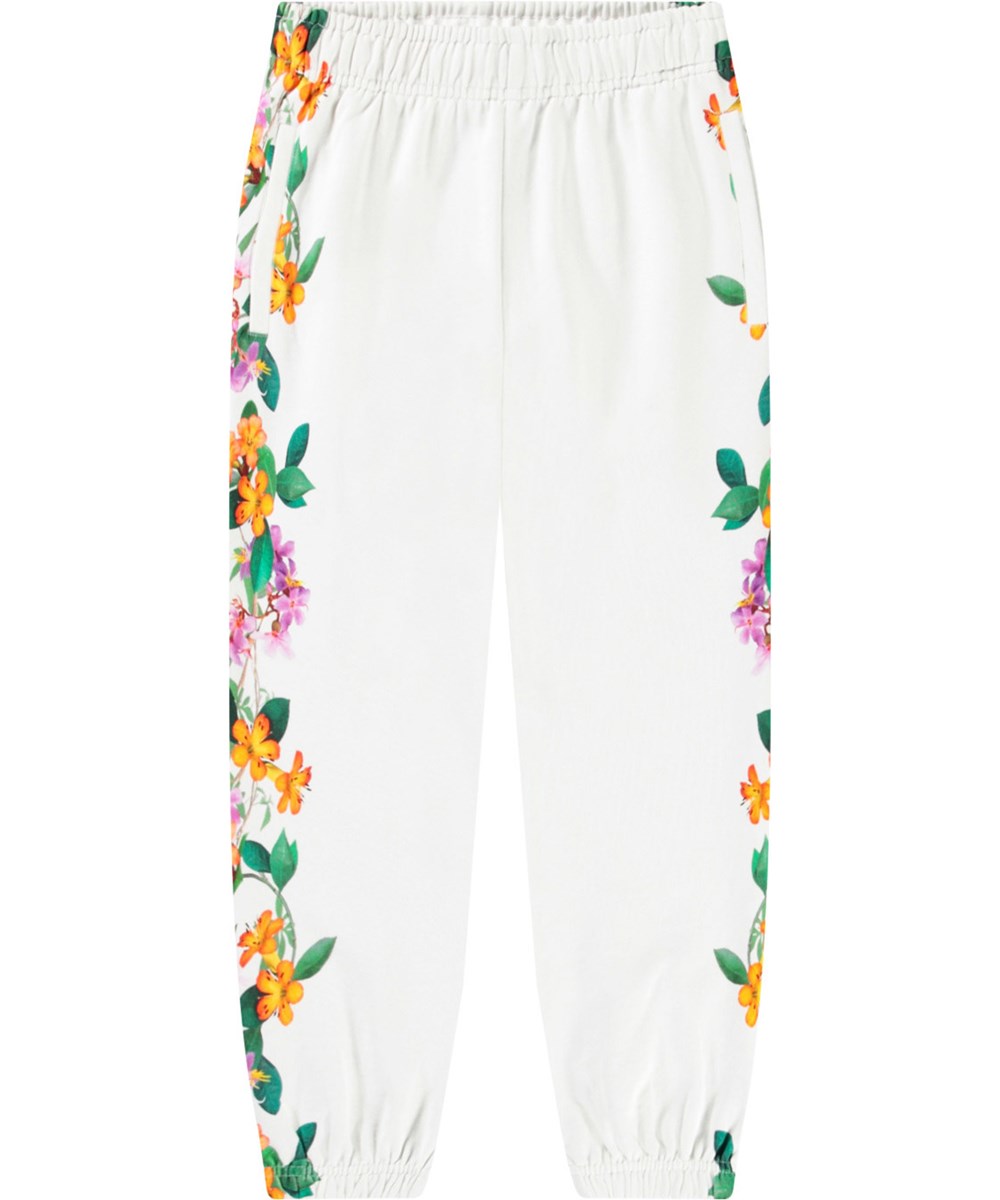 Allen - Jungle Flowers - White sweatpants in organic cotton with jungle flowers for children.
