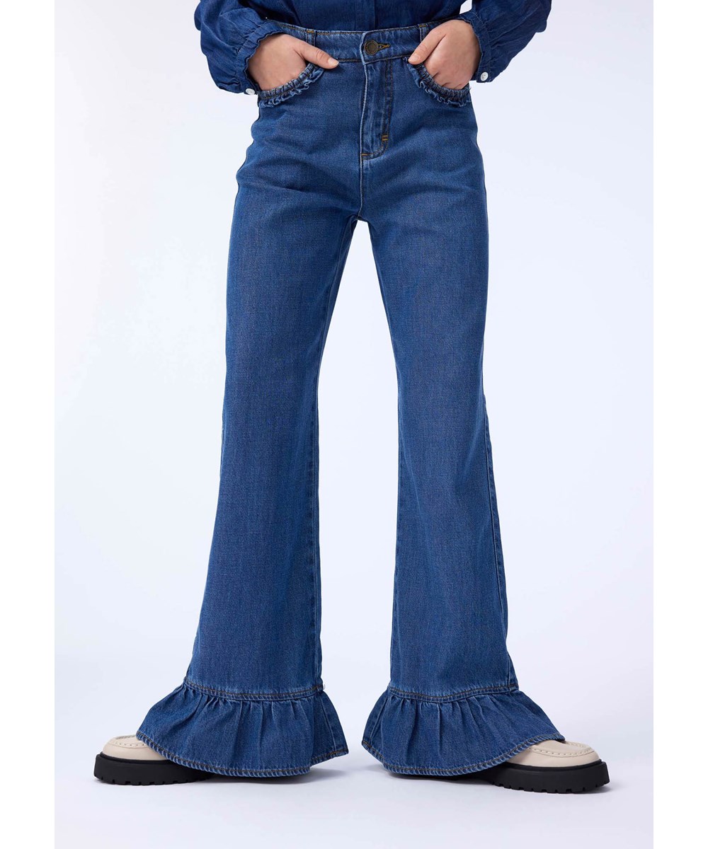 Amara - Blue Vintage - Soft blue denim pants for children made of a viscose and cotton blend.