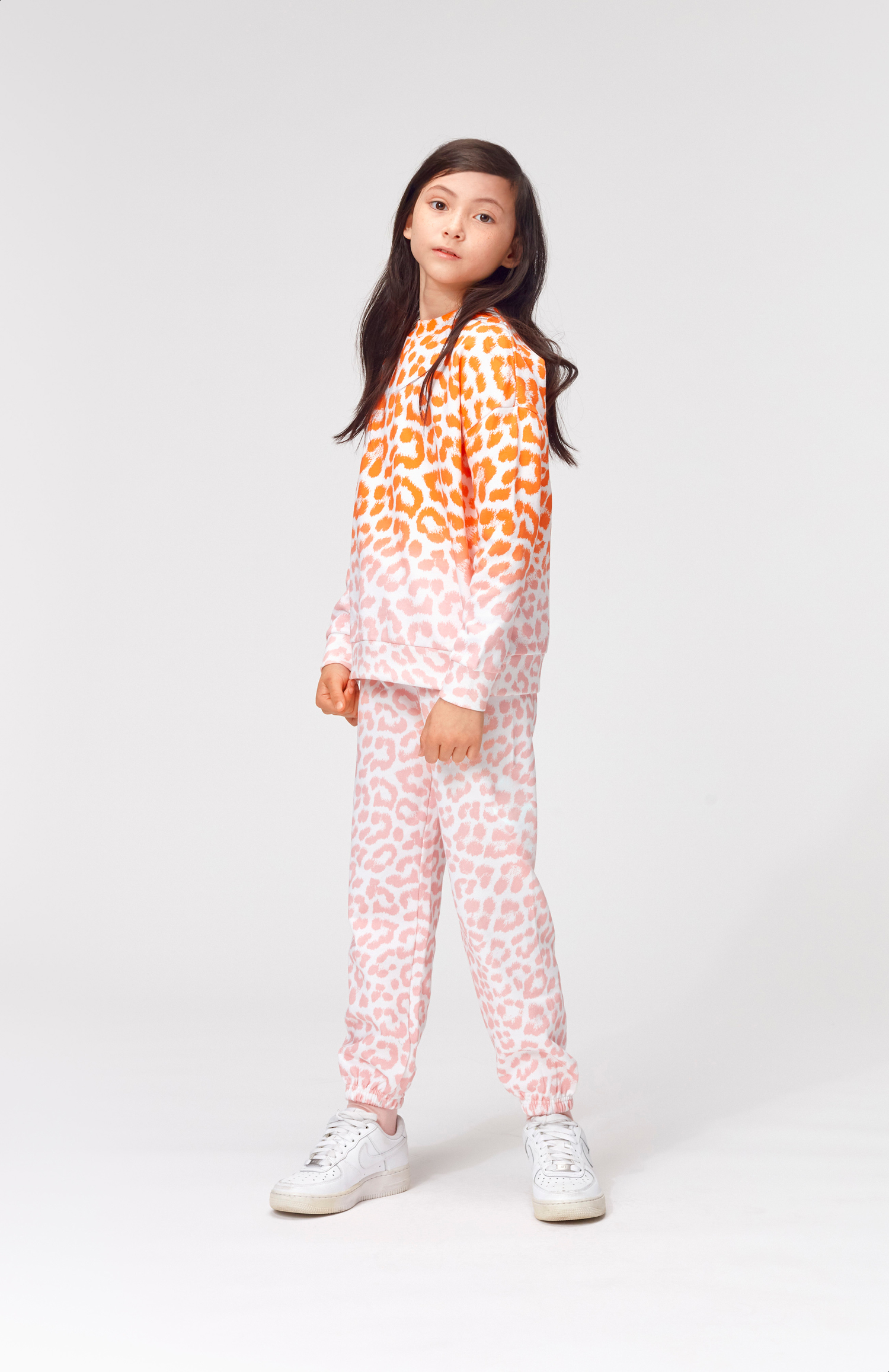 Ammosa Faded Jaguar AOP Organic sweatpants in a pink leopard print Molo