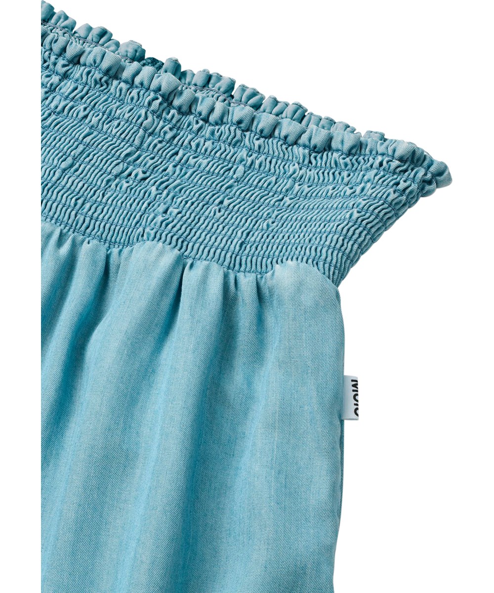 Ania - Washed - Blue viscose trousers for children with smocked elastic at the waist 