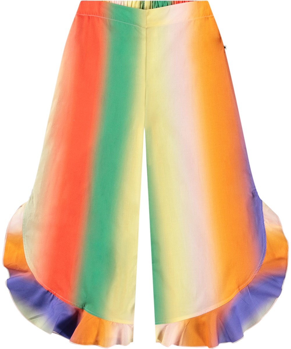 Aretha - Big Rainbow - Airy pants for children with ruffle edge made from organic cotton.