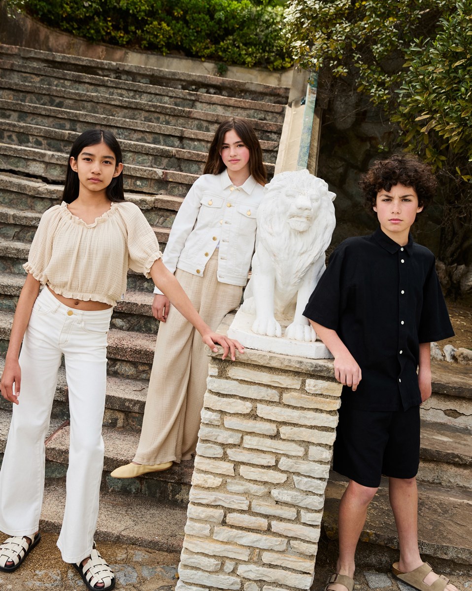 Asta - Crisp White - White jeans with brown stitching for children.