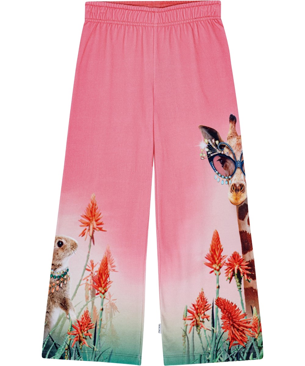Aurita - Fancy Giraf - Pink jersey trousers in organic cotton with orange flower, giraffe, and rabbit prints.