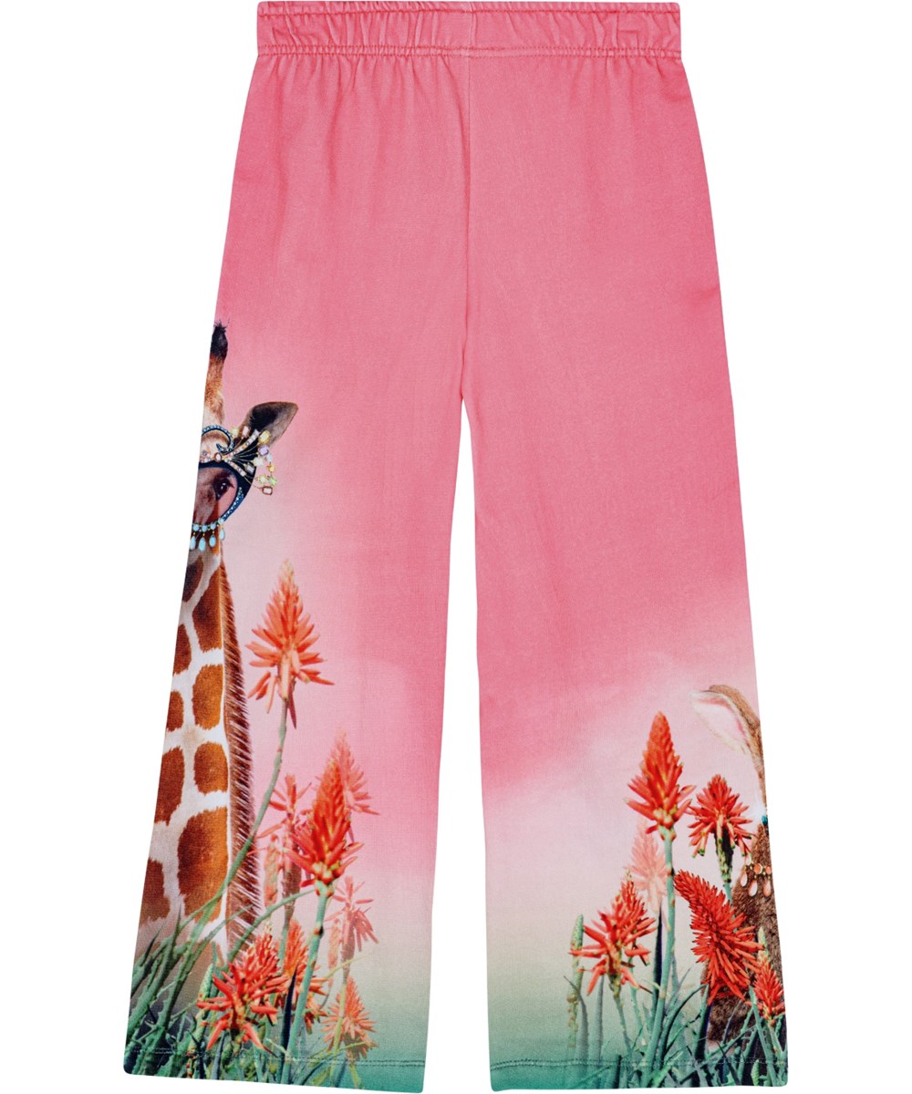 Aurita - Fancy Giraf - Pink jersey trousers in organic cotton with orange flower, giraffe, and rabbit prints.