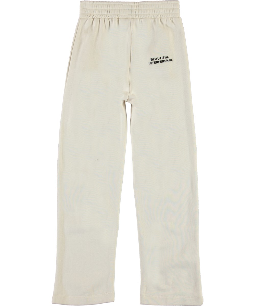 Aurita - Ikebana Place - Light coloured sweatpants with flowers