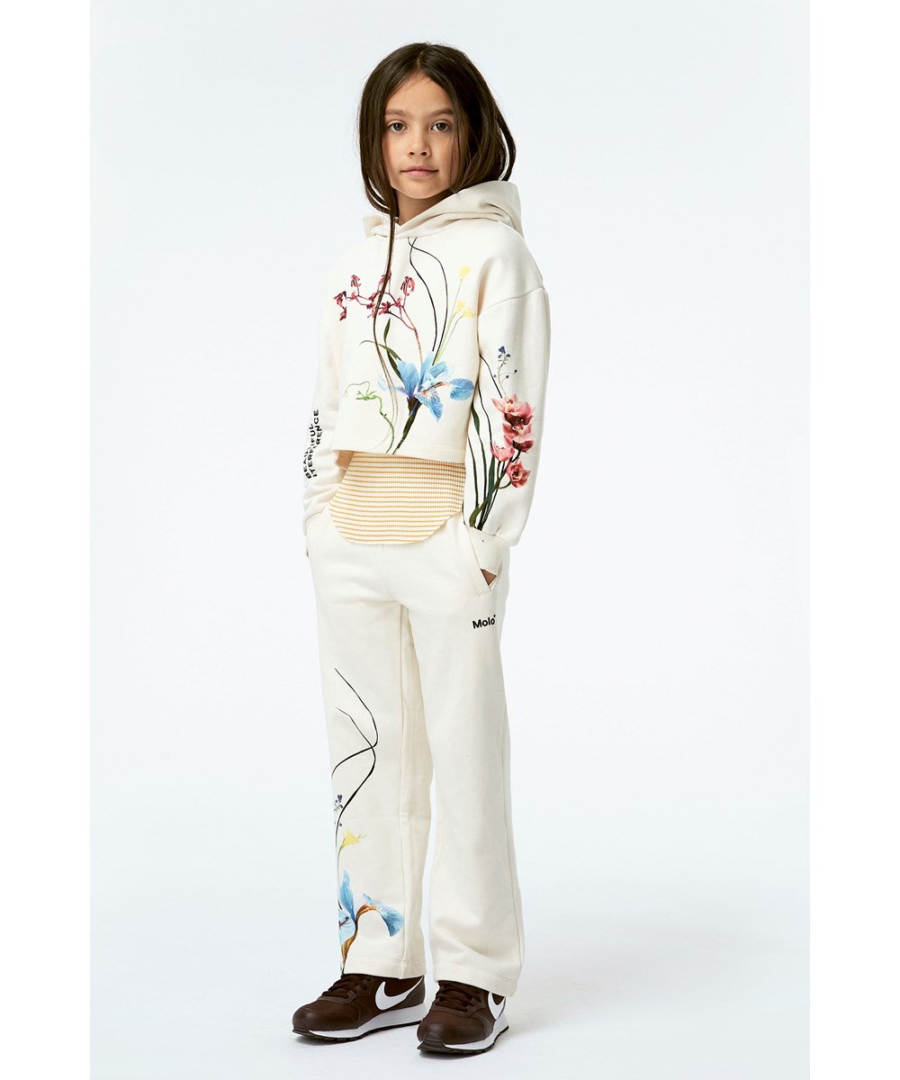 Aurita - Ikebana Place - Light coloured sweatpants with flowers