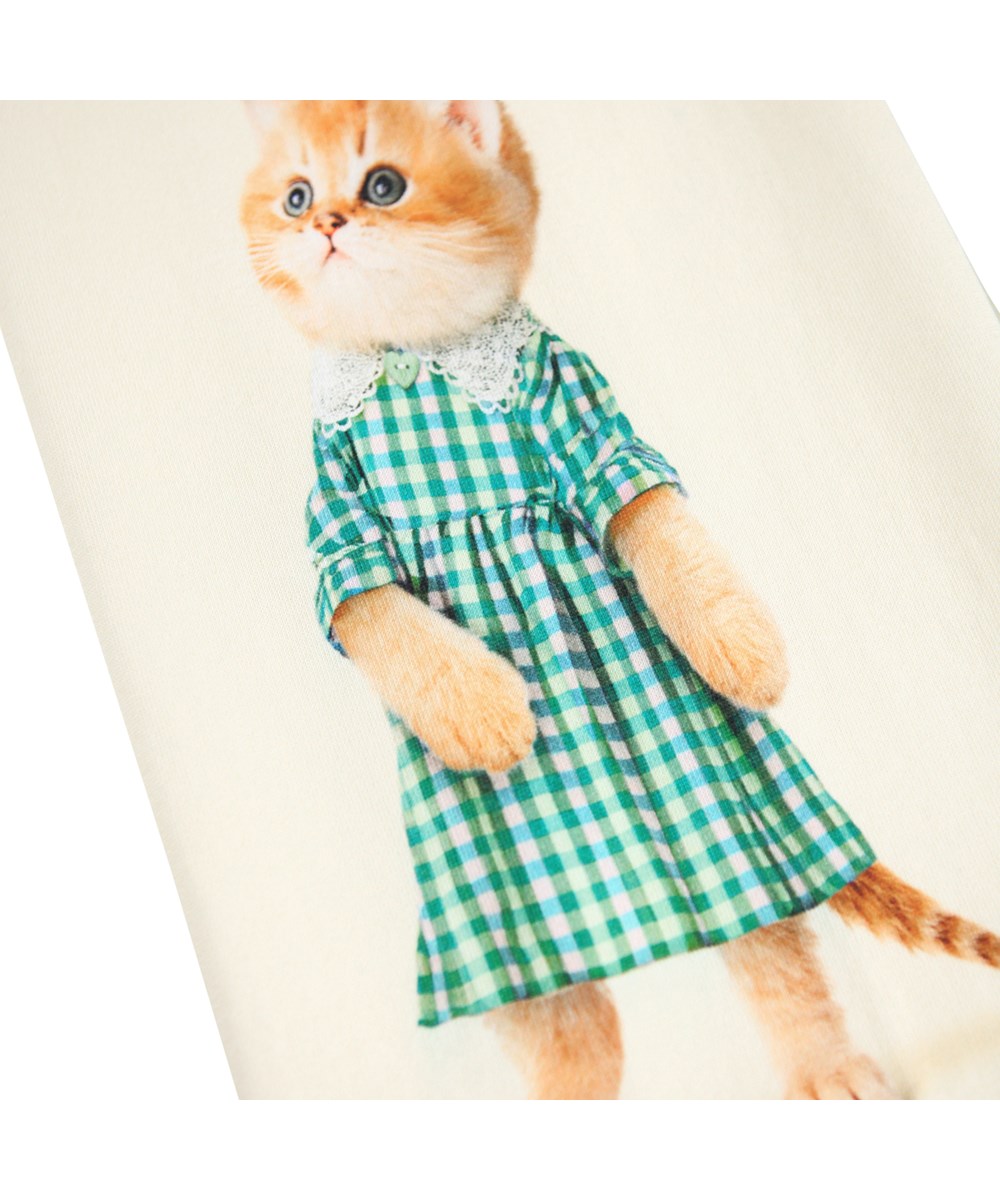 Aurita - Vintage Friends - Off-white sweatpants made of organic cotton with a print of cute animals wearing clothes.