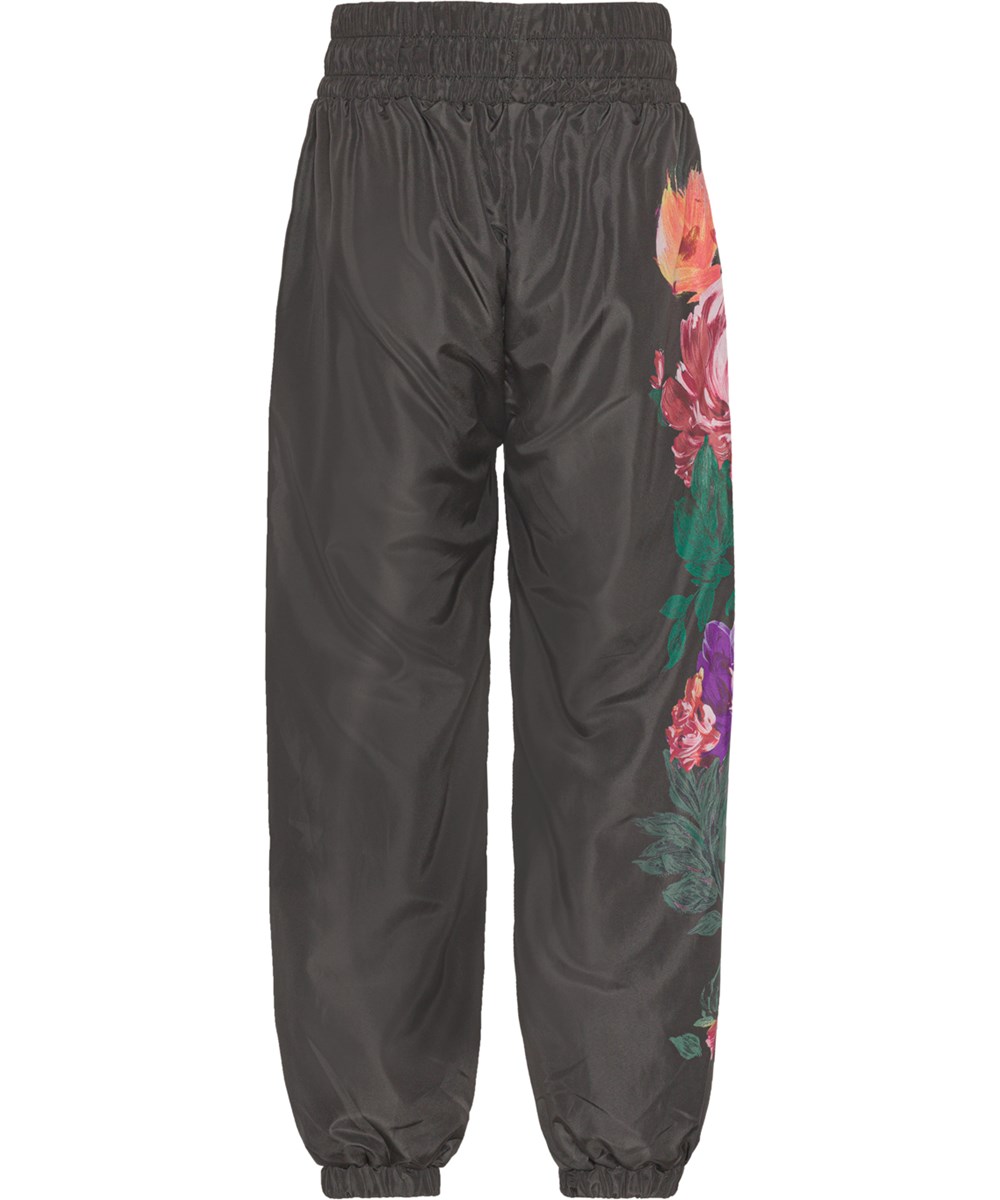 Oleen - Climbing Floral - Black tracksuit joggers with floral print 