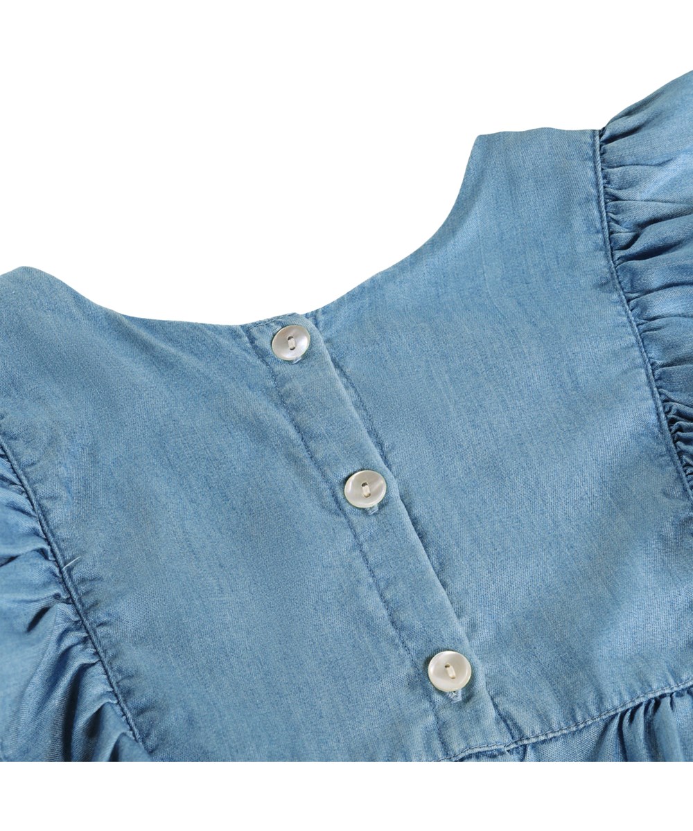 Rashida - Washed - Light blue denim shirt for children made of viscose with ruffles 