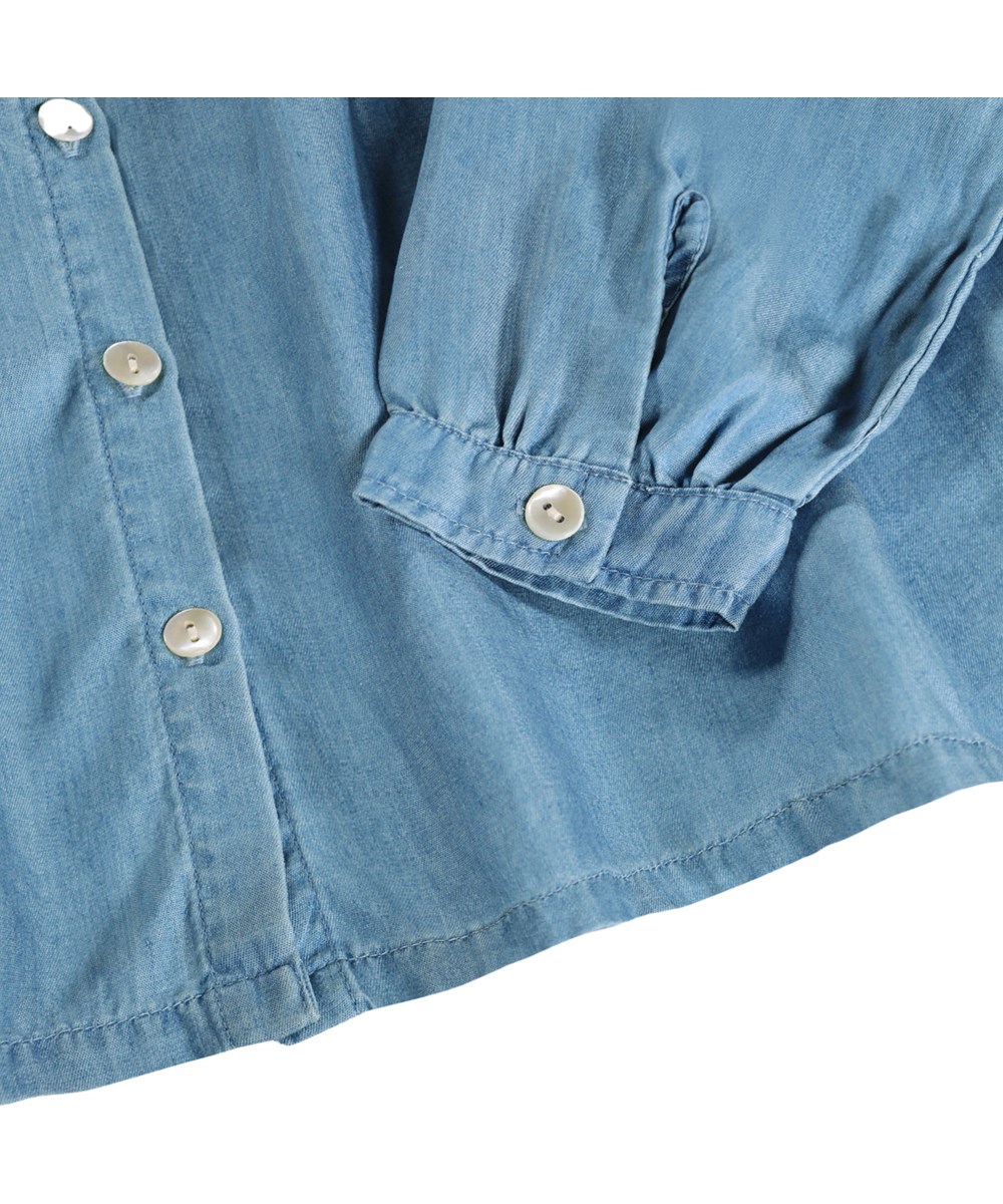 Rashida - Washed - Light blue denim shirt for children made of viscose with ruffles 