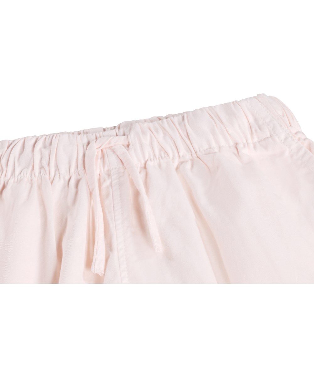 Addie - Cloud Pink - Pink shorts for children made of organic cotton with wavy edges