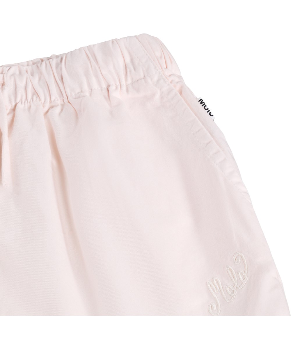 Addie - Cloud Pink - Pink shorts for children made of organic cotton with wavy edges
