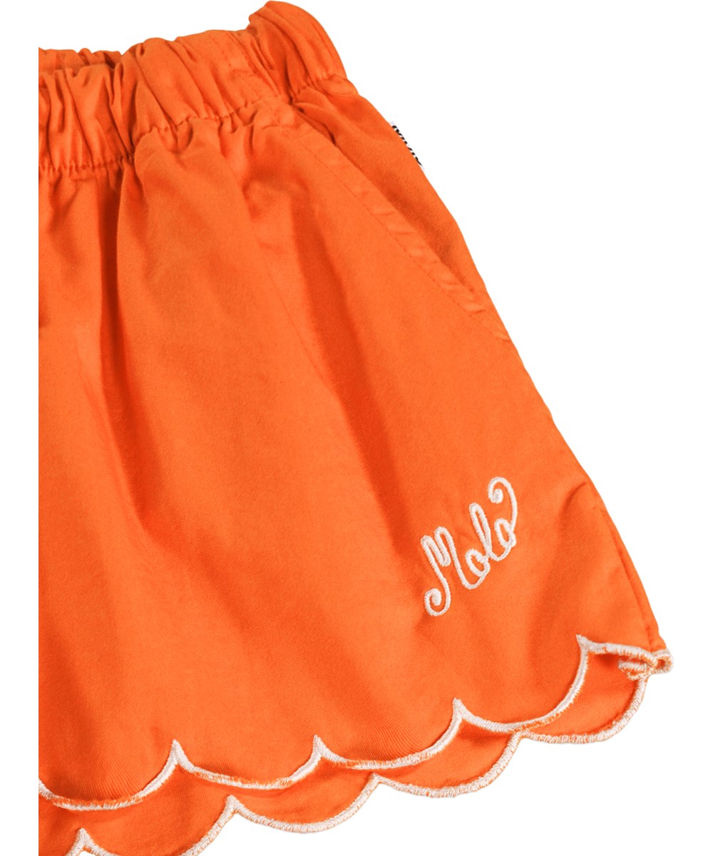 Addie - Love - Orange shorts for children made of organic cotton with wavy edges