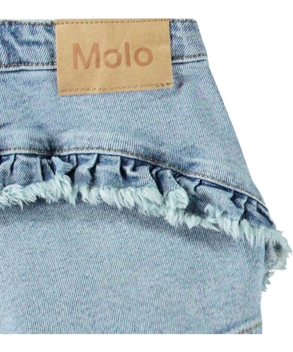 Agnetha - Distressed Washed - Blue denim shorts in organic cotton for children.