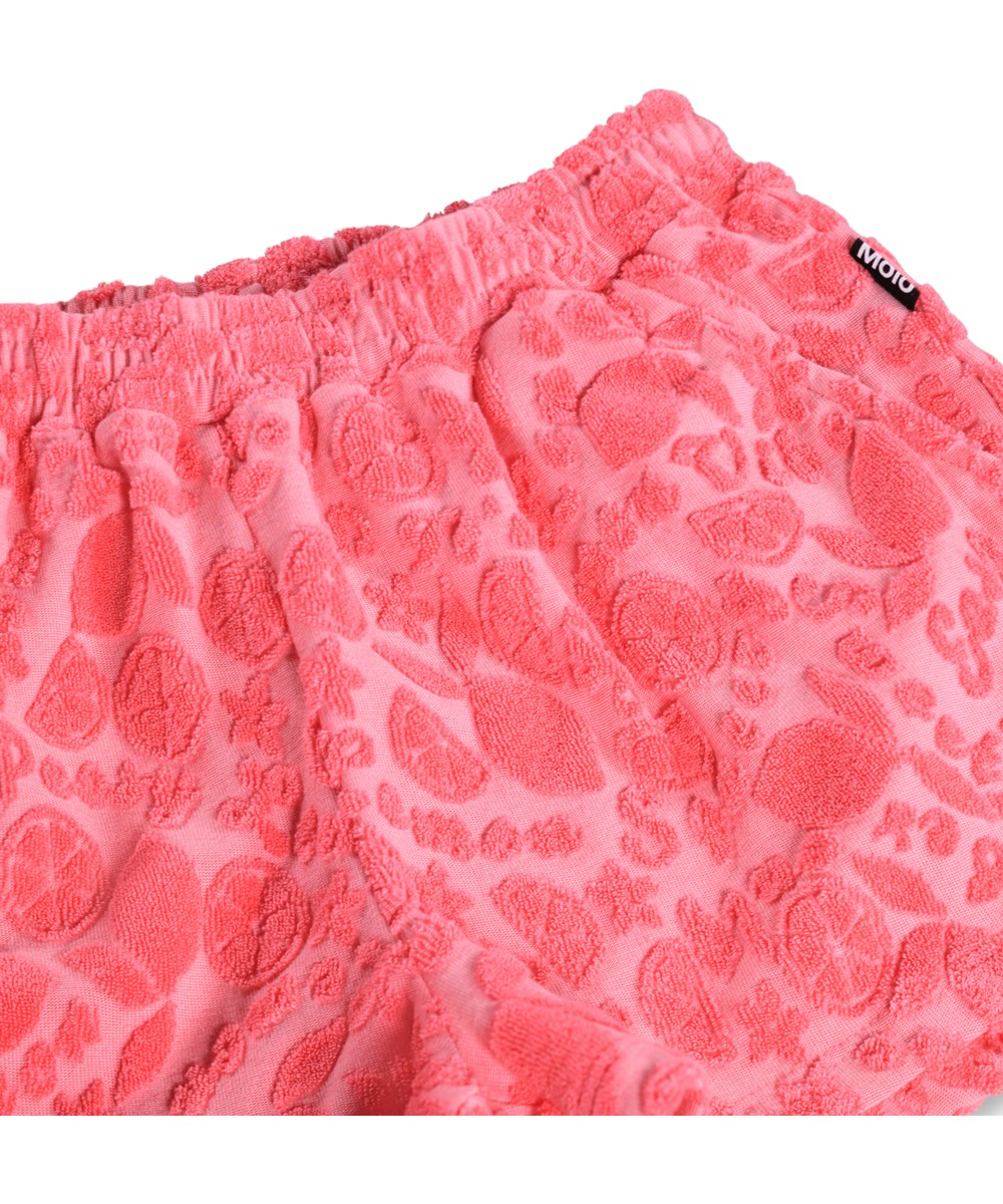 Angela - Lemon Quotes - Pink shorts for children with a pattern of citrus fruits made of cotton terry.