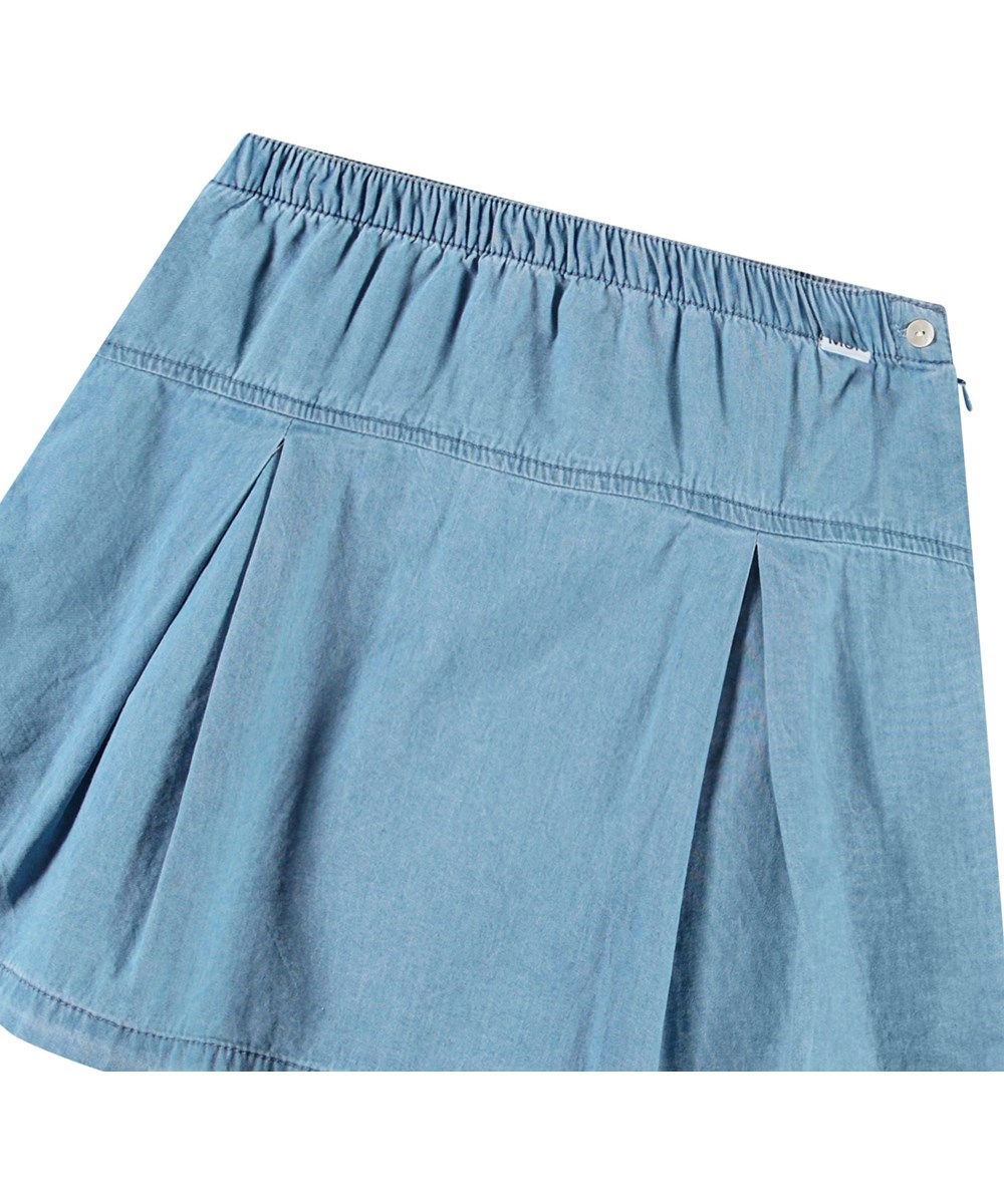 Babette - Sky Indigo - Blue tennis-inspired skirt in organic cotton chambray for children.