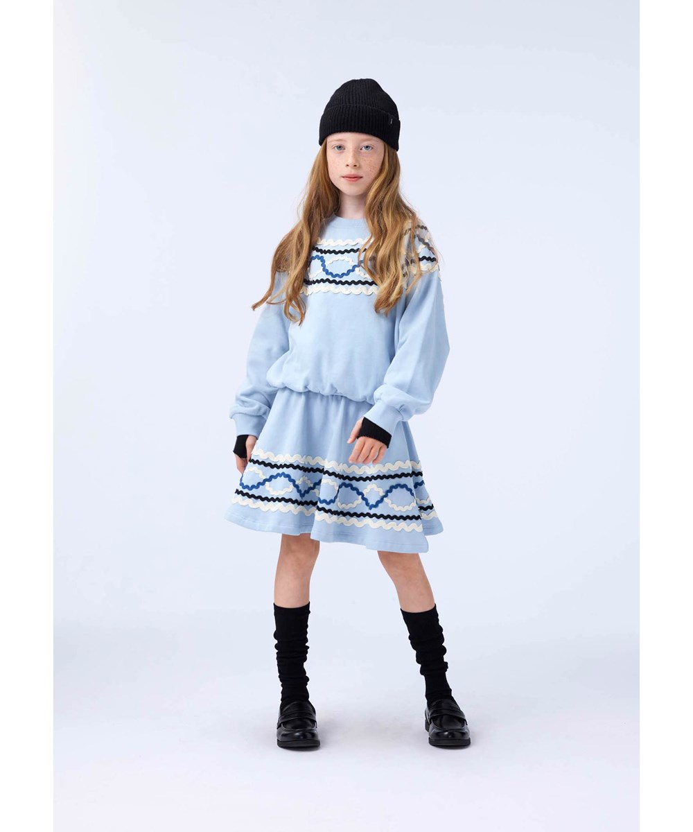 Barbera - Blue Moon - Light blue skirt for children made of organic cotton with colourful sewn-on ribbons.