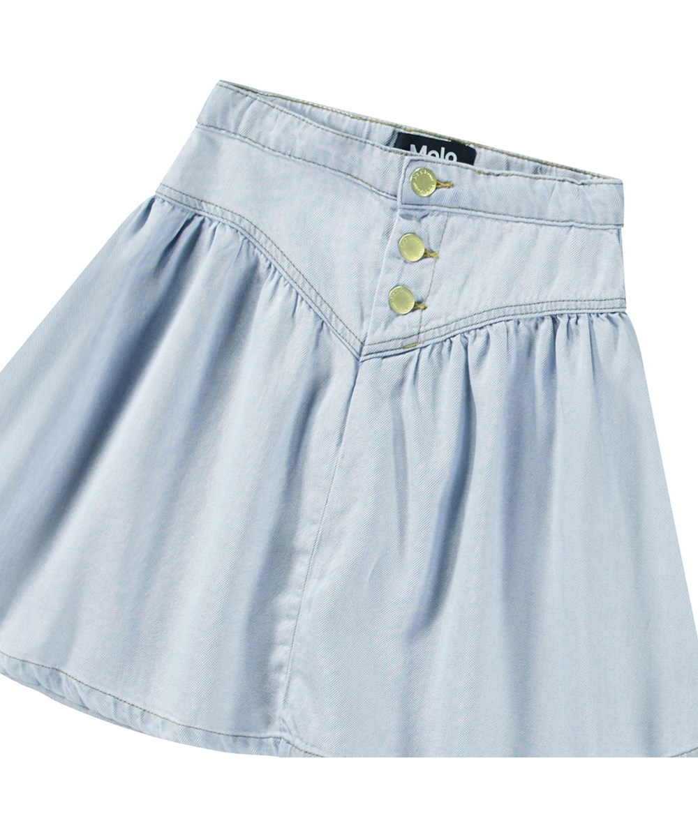 Betsy - Bleached Drapy - Light blue denim skirt with a lovely yoke and button closure for children.