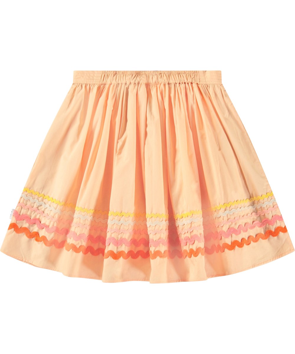 Bini - Pale Melon - Peach-coloured skirt in organic cotton for children. Multi-coloured wavy-effect trim at the bottom of the skirt.