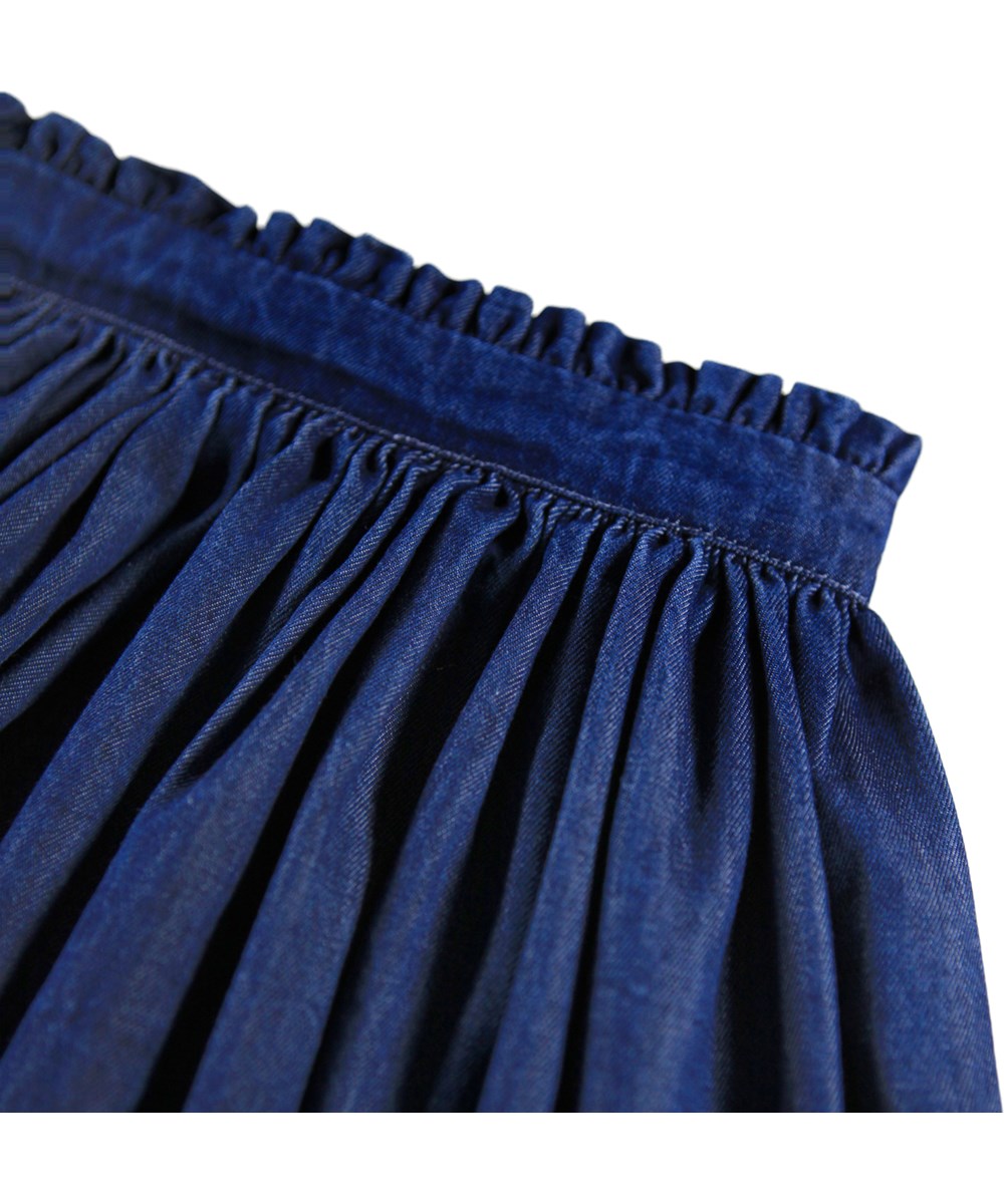 Bitta - Oak Embroidery - Blue skirt for children made of organic cotton chambray with white English embroidery.