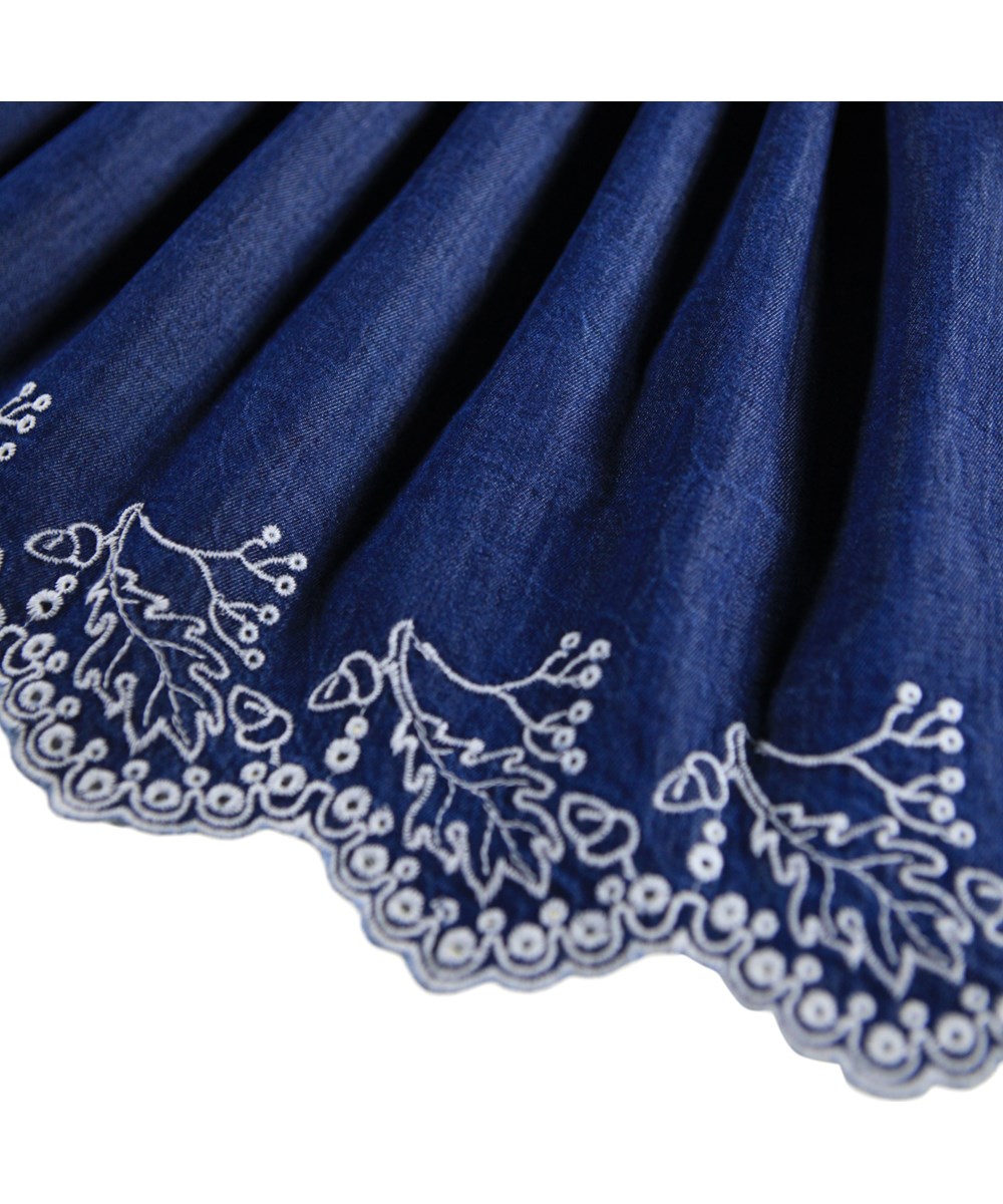 Bitta - Oak Embroidery - Blue skirt for children made of organic cotton chambray with white English embroidery.