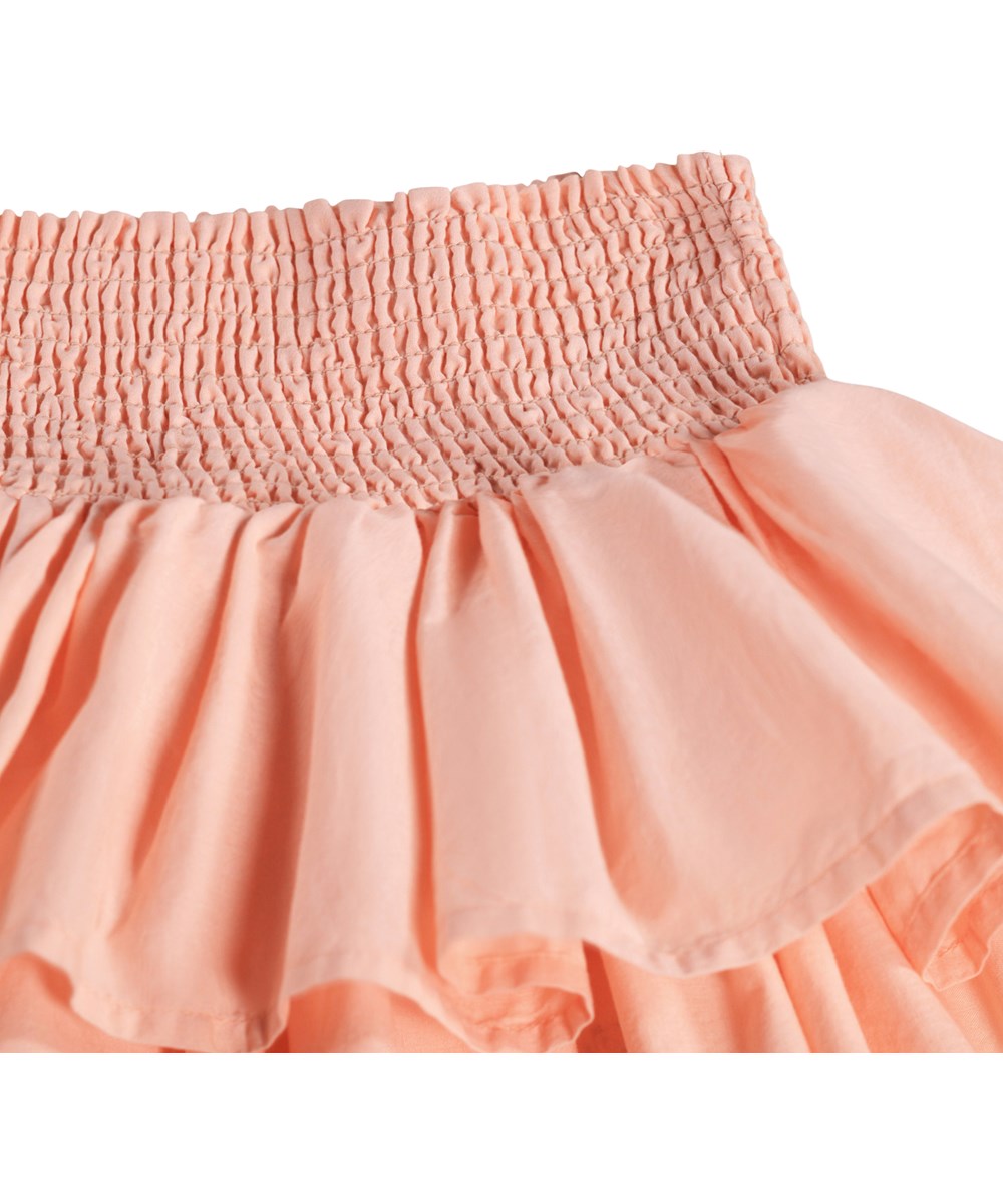 Bonita - Peach Bud - Knee-length peach-coloured skirt for children made of organic cotton 