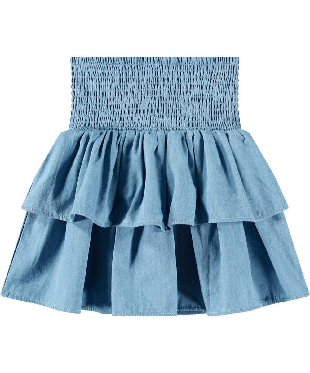 Bonita - Sky Indigo - Blue knee-length skirt in organic cotton chambray with smocking for children.