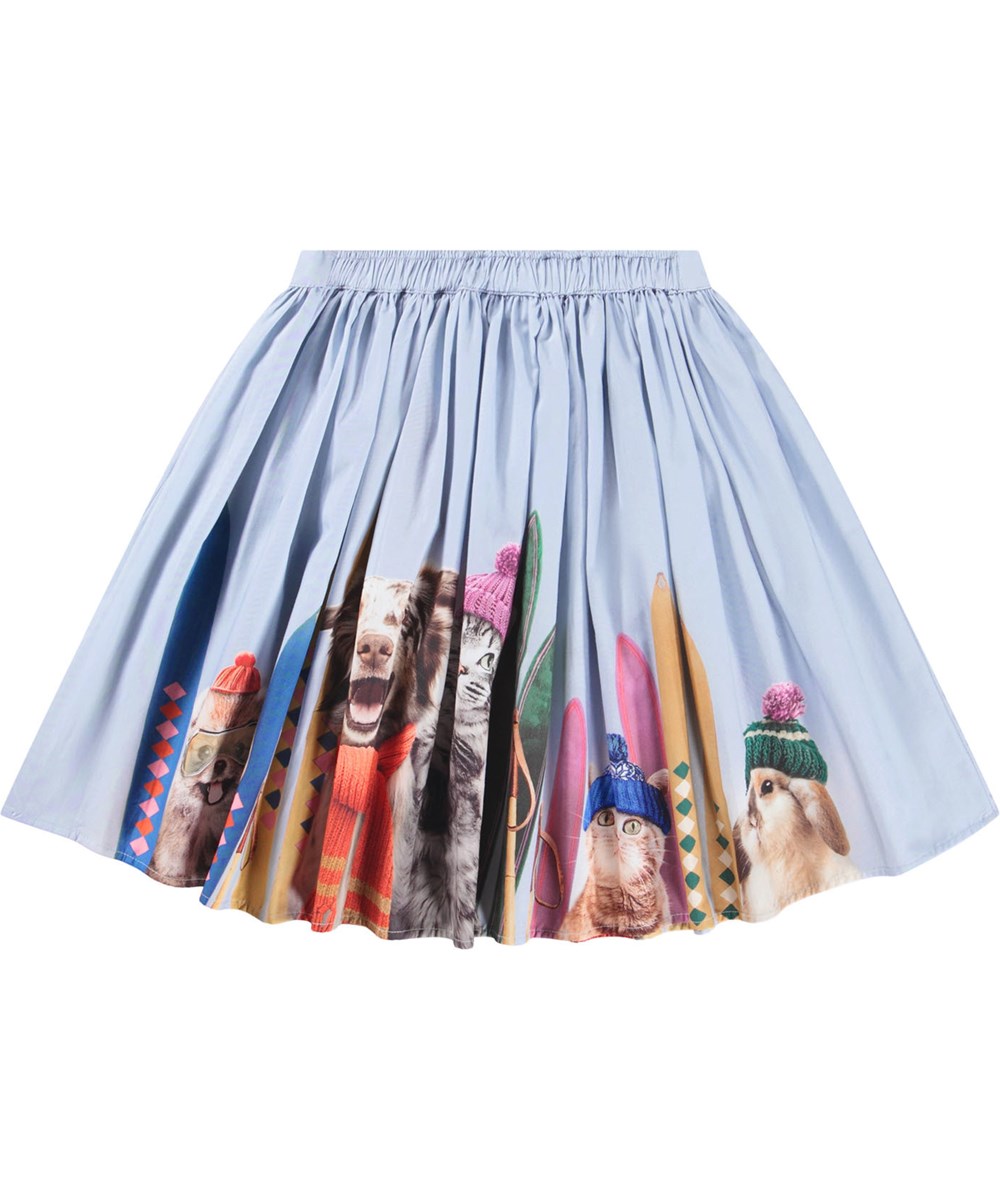 Bonnie - Going Skiing - Light blue knee-length skirt for children made of organic cotton with a print of animals on a skiing trip.