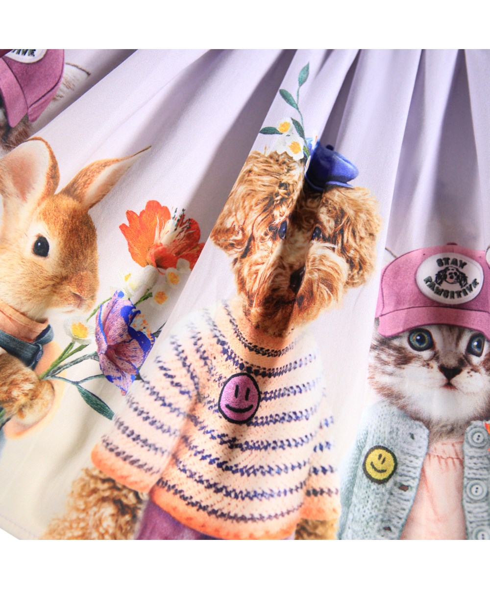 Brenda - Cuties - Purple circular-cut skirt made of organic cotton with a print of cute animals wearing clothes.