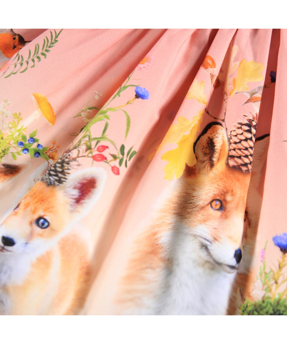 Brenda - Nature Glam - Pink circular-cut skirt made of corganic cotton with a print of animal cubs and flowers.