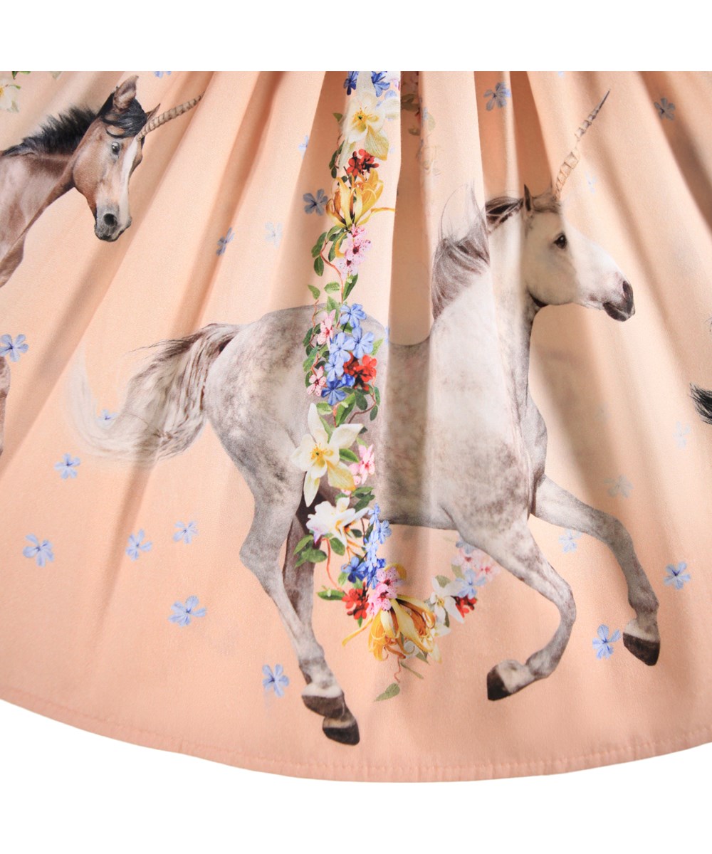 Brenda - Universal Flora - Rose circular-cut skirt made of organic cotton with a print of horses and flowers.