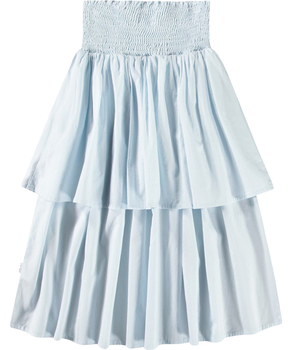 Brenna - Skywriting - Light blue long skirt with a wide smocked waistband for children.