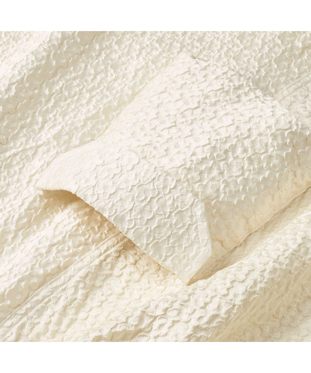 Brina - Buttercream - Off- white voluminous skirt with floral pattern.