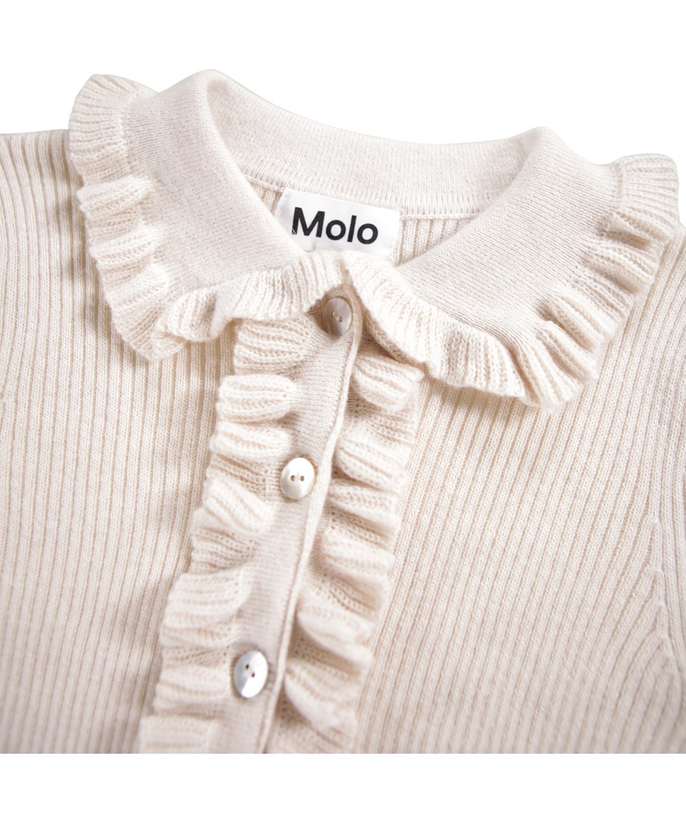 Gamora - Buttercream - Lovely off-white fitted cardigan for children made of a wool and cotton blend.