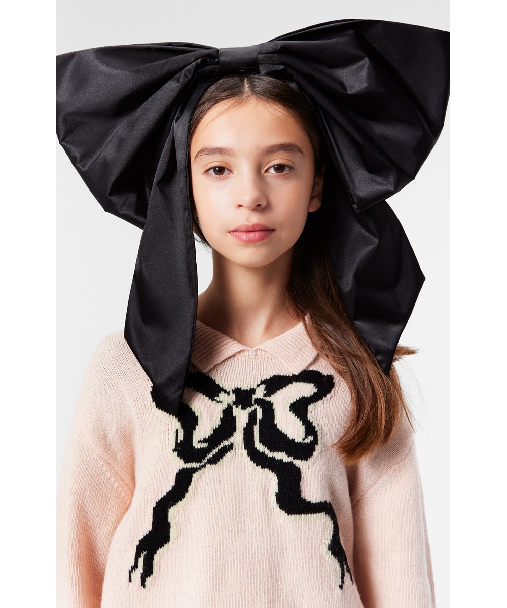 Gerd - Petal Blush - Powder pink wool-blend jumper with knitted collar and black bow.