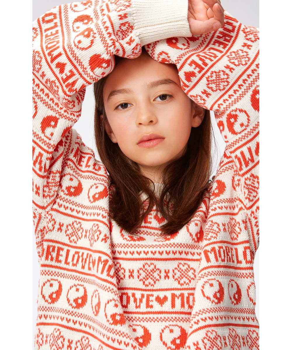 Gerrie - Yin Yang Knit - Off-white, knit jumper with red yin/yang symbols, Molo's heart clovers and 'more love'