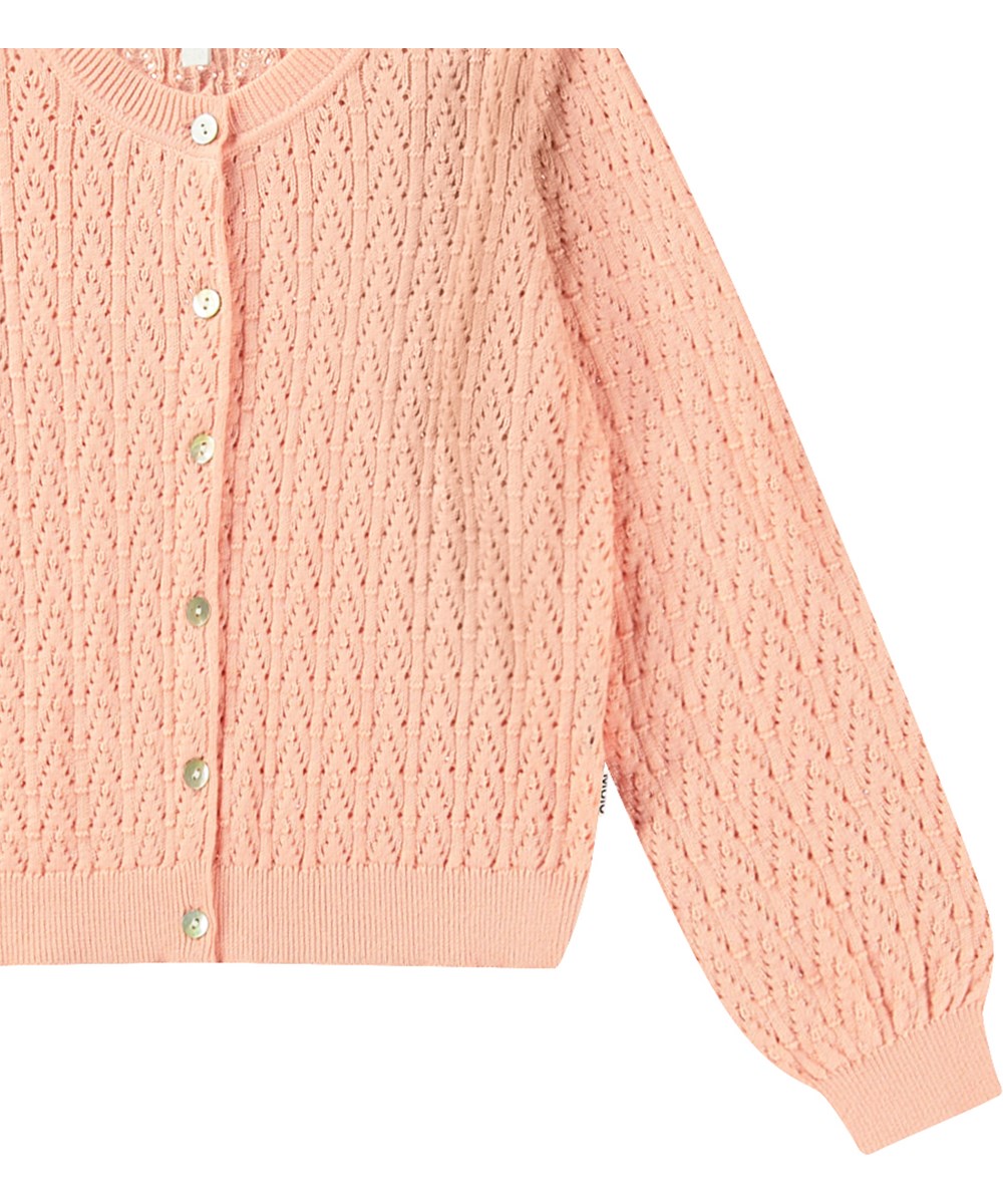 Gillian - Peach - Light orange knitted cardigan for children in soft organic cotton with a lovely lace pattern.